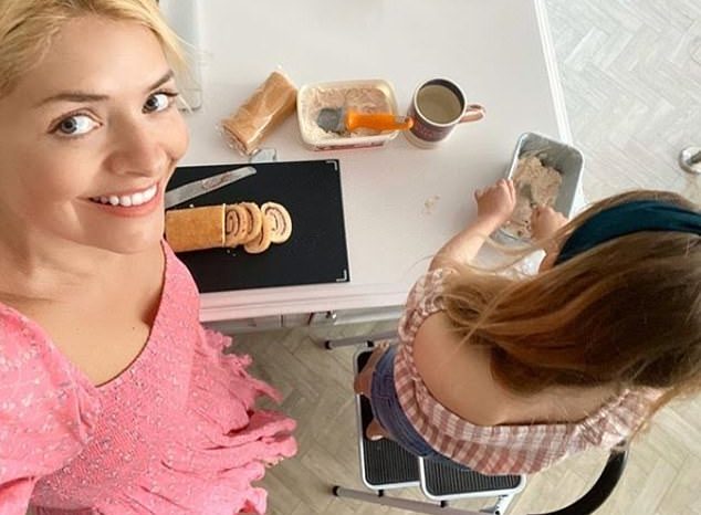 Holly Willoughby shares a rare glimpse of daughter Belle as they bake an ice cream cake for her 9th birthday during coronavirus lockdown