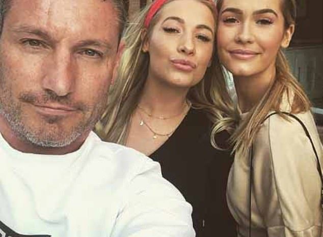 EastEnders star Dean Gaffney, 42, poses with his twin daughters, 23, and says 'family is everything at this time'