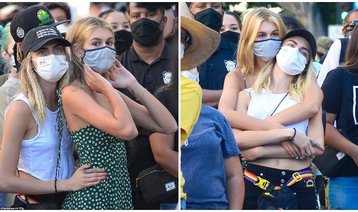 Cara Delevingne gets VERY hands-on with Kaia Gerber as model pals put on a very affectionate display at a Black Lives Matter protest in Los Angeles