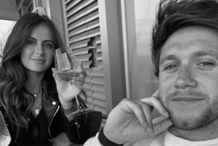 One Direction star Niall Horan is in a secret relationship with designer shoe buyer Amelia Woolley after dating for two months